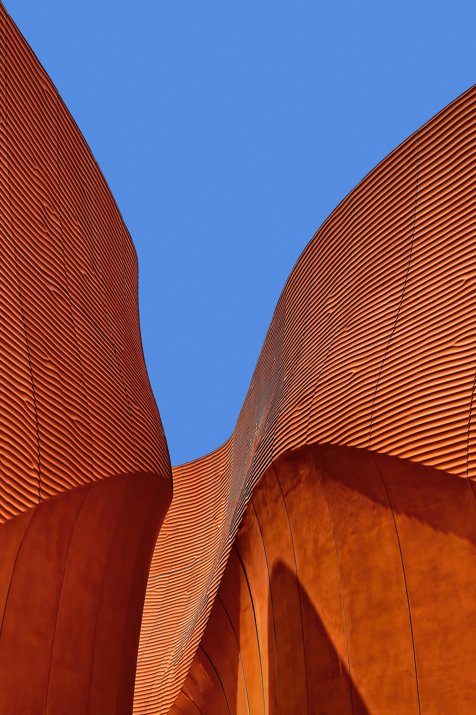 A warm terracotta archway